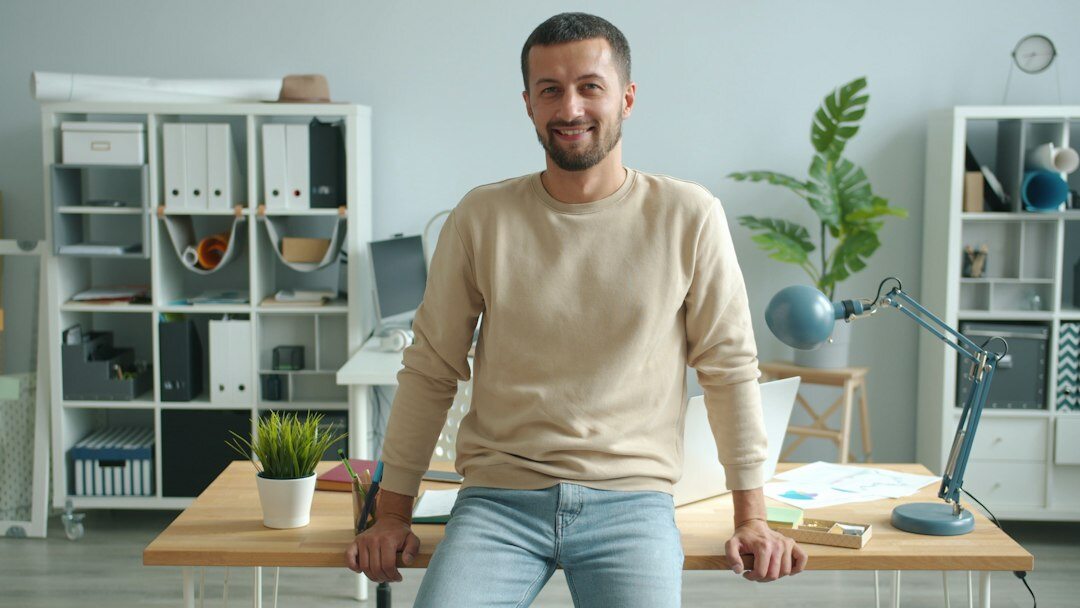 confident professional at desk